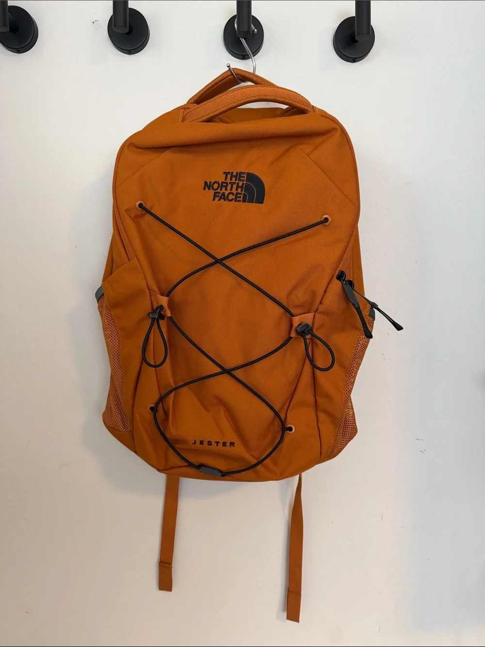 North Face Jester Backpack in burnt orange & black accents Excellent Condition